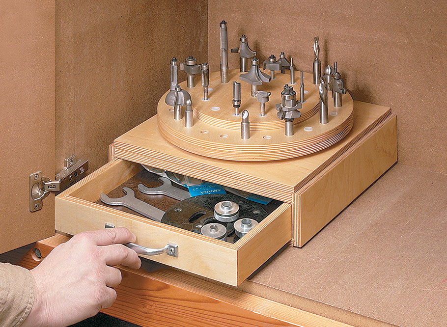 b'With a handy, revolving bit carousel on top and drawers below, this expandable storage system is the answer to all your router storage needs.'