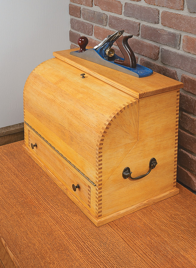 b'Classic box joints and a coopered lid combine to create a stylish home for your tools.\r\n'