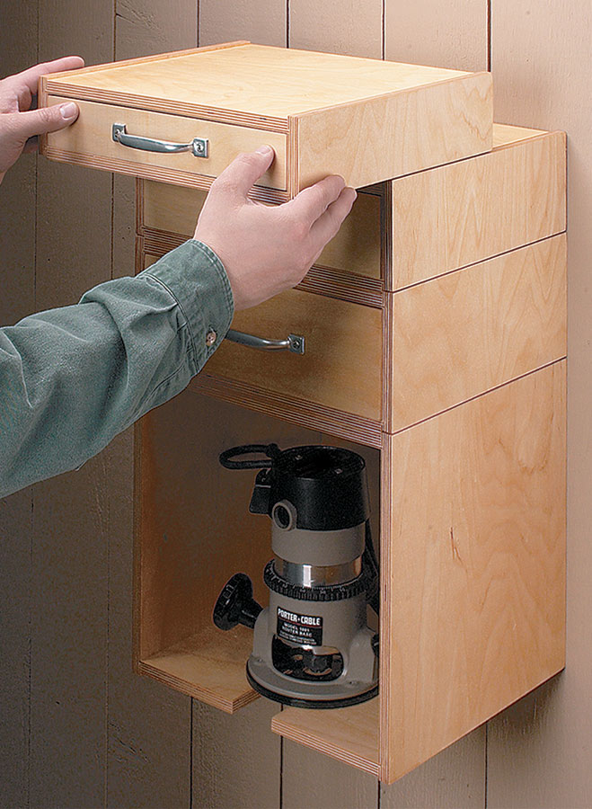 b'With a handy, revolving bit carousel on top and drawers below, this expandable storage system is the answer to all your router storage needs.'