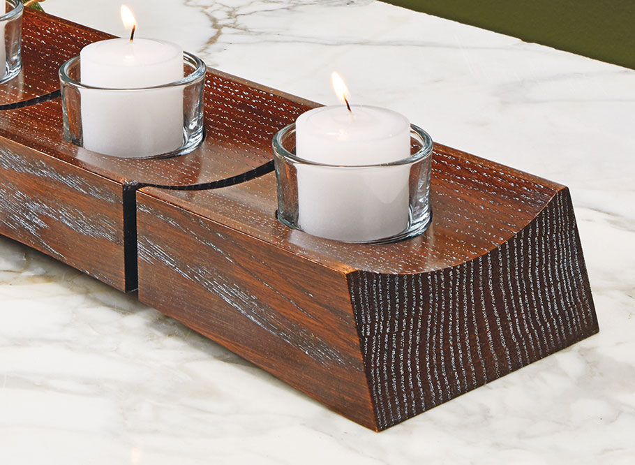 b'A block of wood and a couple of hours of shop time are all you need to build this attractive candle centerpiece. It makes a great last-minute gift idea.'